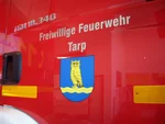 Aufschrift auf Feuerwehrauto der Freiwilligen Feuerwehr Tarp